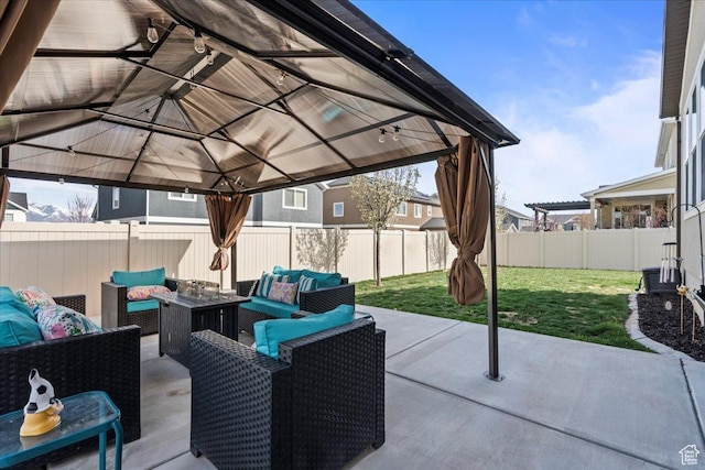12133 S Broken Arch Ln, Herriman, UT 84096 - view of patio with a fenced backyard, a gazebo, and an outdoor hangout area