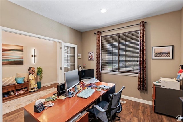 12133 S Broken Arch Ln, Herriman, UT 84096 - office area featuring baseboards and dark wood-style floors