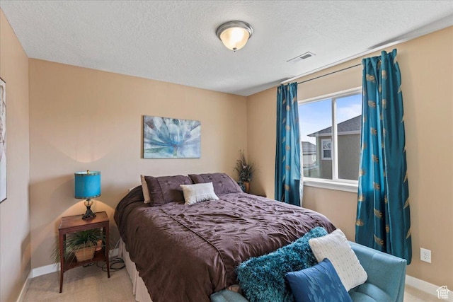 12133 S Broken Arch Ln, Herriman, UT 84096 - carpeted bedroom with visible vents, a textured ceiling, and baseboards