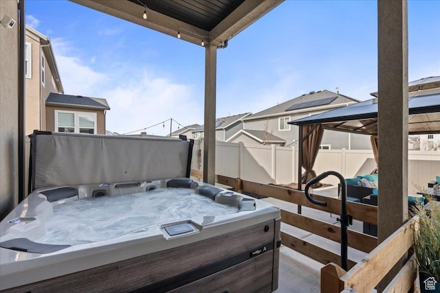 12133 S Broken Arch Ln, Herriman, UT 84096 - wooden terrace with a gazebo, fence, and a hot tub
