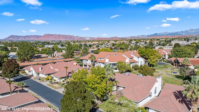 drone / aerial view with a mountain view and a residential view