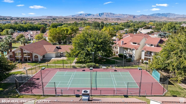 birds eye view of property featuring a mountain view and a residential view