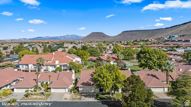 aerial view with a mountain view and a residential view