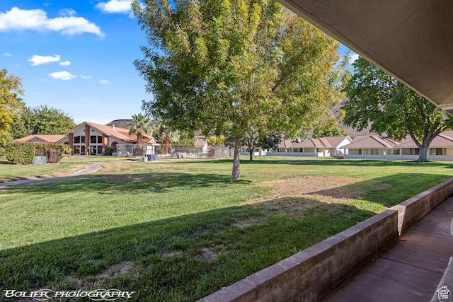 surrounding community with a lawn