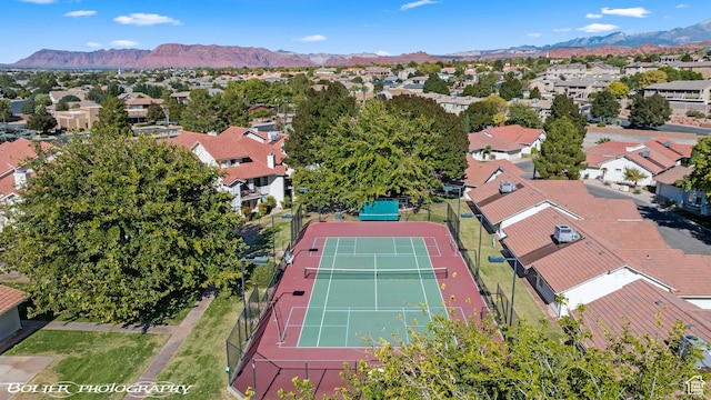 aerial view featuring a mountain view and a residential view