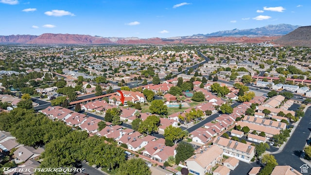 drone / aerial view featuring a mountain view and a residential view