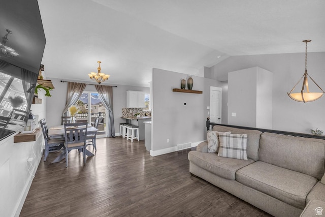 11873 S Coles Camp Cir W, Herriman, UT 84096 - living room featuring baseboards, an inviting chandelier, dark wood-style floors, visible vents, and lofted ceiling