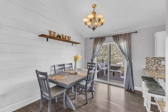 11873 S Coles Camp Cir W, Herriman, UT 84096 - dining space with baseboards, dark wood-style flooring, a notable chandelier, and lofted ceiling