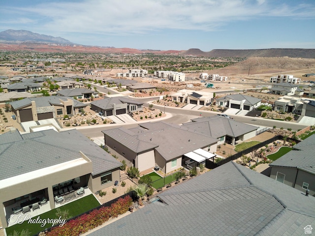 drone / aerial view with a mountain view and a residential view