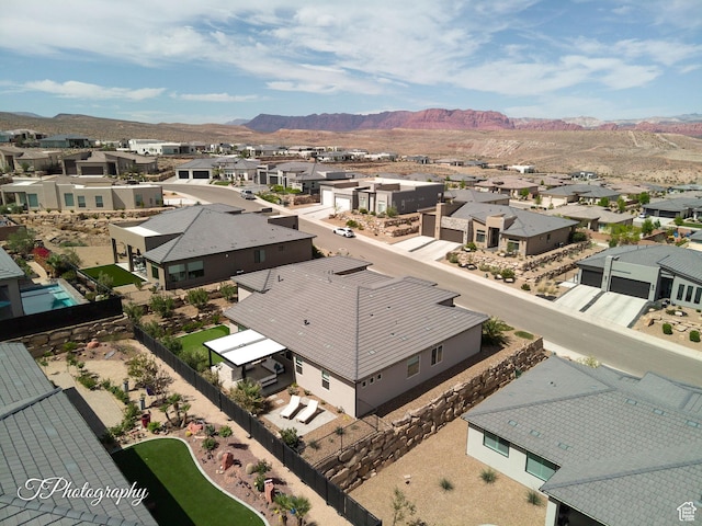 bird's eye view featuring a residential view and a mountain view