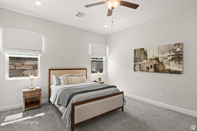 carpeted bedroom with visible vents, baseboards, recessed lighting, and ceiling fan