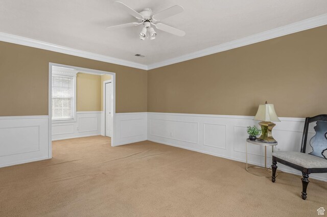 506 S 1200 E, Bountiful, UT 84010 - spare room with light colored carpet, a ceiling fan, ornamental molding, visible vents, and a wainscoted wall