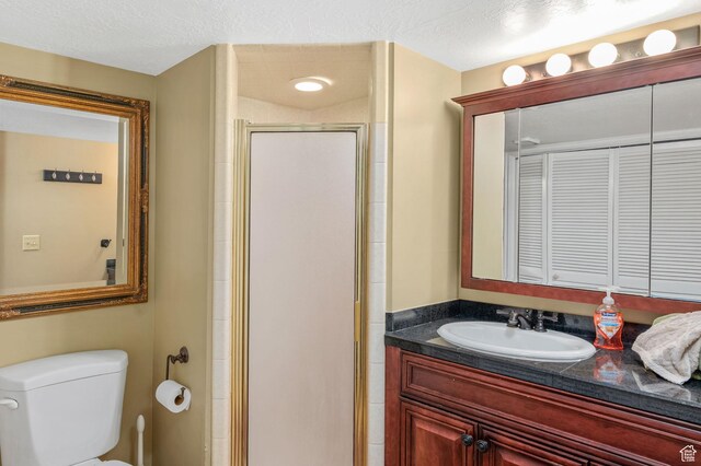 506 S 1200 E, Bountiful, UT 84010 - bathroom with a shower stall, vanity, and toilet