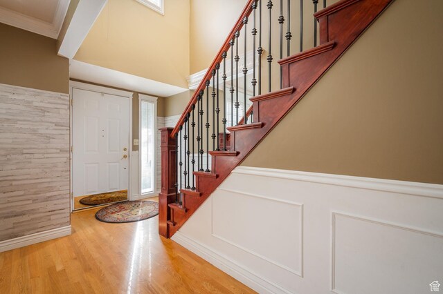 506 S 1200 E, Bountiful, UT 84010 - foyer entrance with a wealth of natural light, stairs, ornamental molding, and wood finished floors