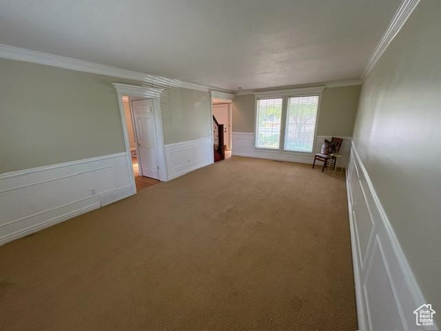 506 S 1200 E, Bountiful, UT 84010 - unfurnished room featuring ornamental molding, carpet flooring, and wainscoting