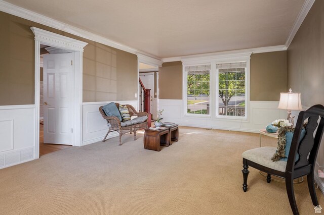 506 S 1200 E, Bountiful, UT 84010 - living area with a decorative wall, ornamental molding, and carpet floors