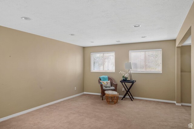 506 S 1200 E, Bountiful, UT 84010 - sitting room with a textured ceiling, light colored carpet, and baseboards