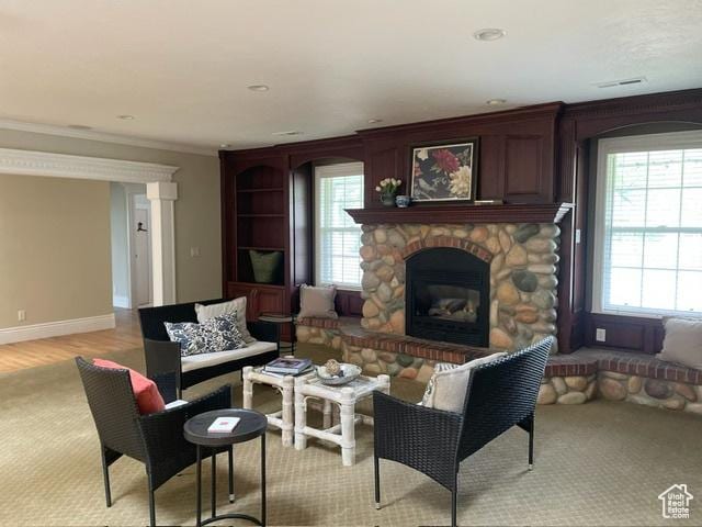 506 S 1200 E, Bountiful, UT 84010 - living area featuring crown molding, a fireplace, baseboards, and recessed lighting