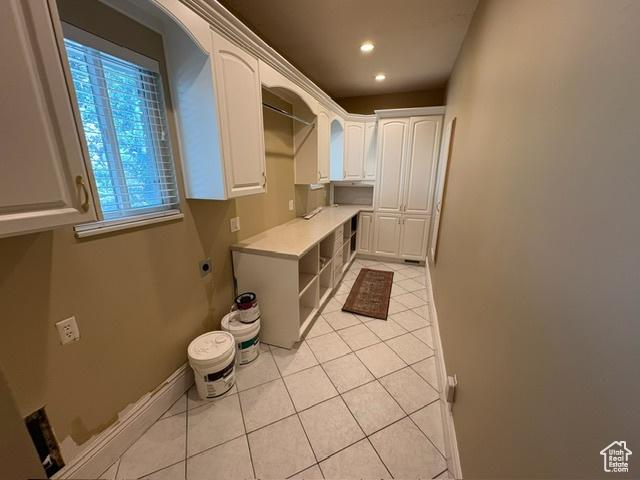 506 S 1200 E, Bountiful, UT 84010 - washroom featuring light tile patterned flooring, electric dryer hookup, cabinet space, recessed lighting, and baseboards