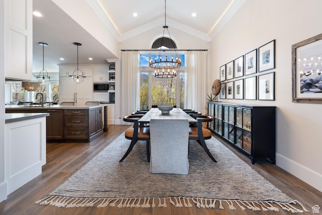 dining room with high vaulted ceiling, baseboards, a notable chandelier, and dark wood-style flooring