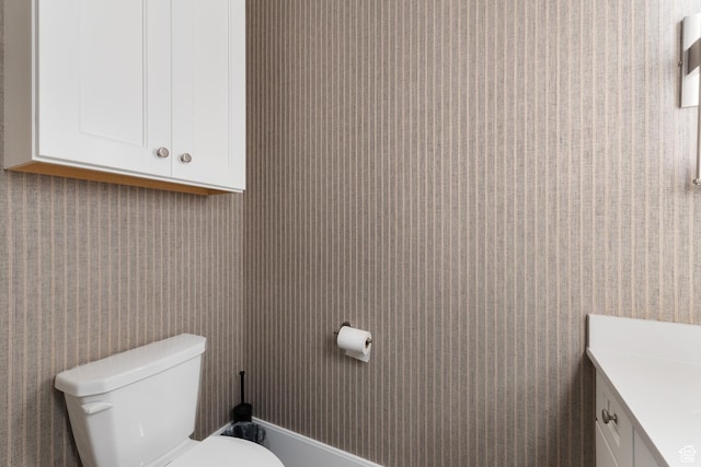 half bath with toilet and vanity