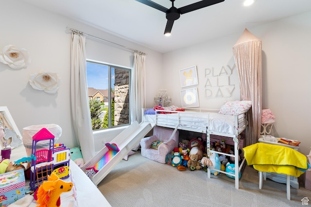 carpeted bedroom featuring ceiling fan