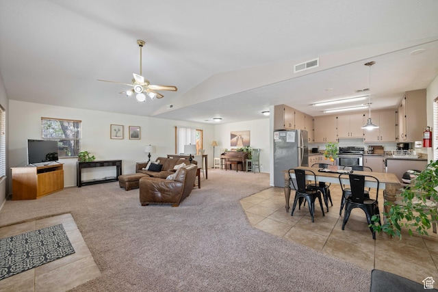 247 S 100 E, Hurricane, UT 84737 - living room with light colored carpet, ceiling fan, lofted ceiling, and visible vents