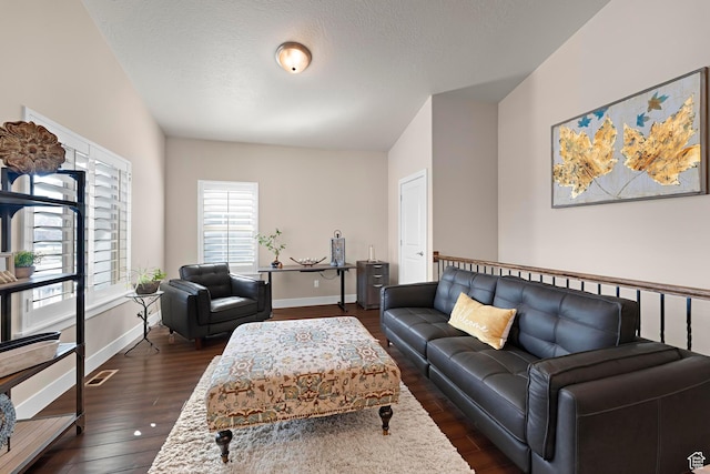 10756 S Autumn Wind Way W, South Jordan, UT 84009 - living area with visible vents, baseboards, and wood finished floors