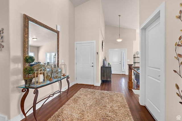 10756 S Autumn Wind Way W, South Jordan, UT 84009 - entryway featuring high vaulted ceiling, baseboards, and dark wood finished floors