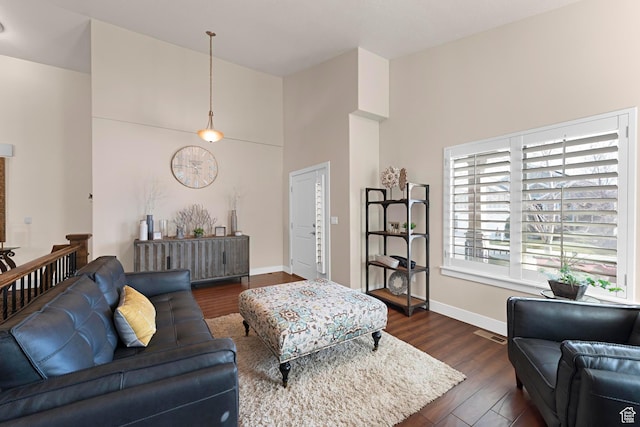 10756 S Autumn Wind Way W, South Jordan, UT 84009 - living room with visible vents, baseboards, a towering ceiling, and dark wood finished floors