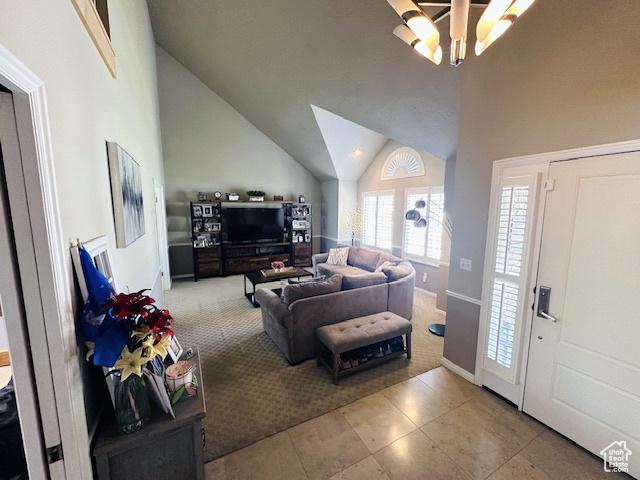 470 E Bridlewalk Ln S, Murray, UT 84107 - tiled living area featuring baseboards and vaulted ceiling