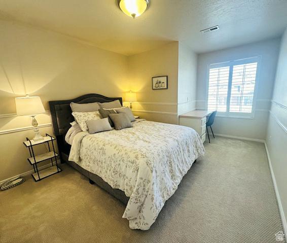 470 E Bridlewalk Ln S, Murray, UT 84107 - carpeted bedroom with baseboards and visible vents