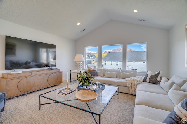 living room featuring recessed lighting, visible vents, and vaulted ceiling