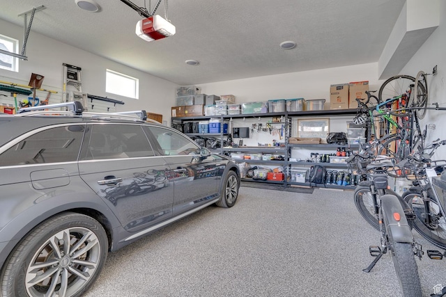 garage featuring a garage door opener
