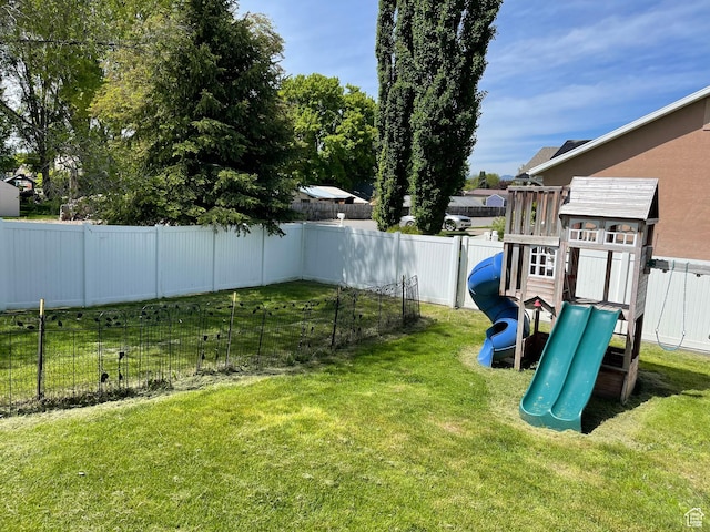 129 N 3rd E, Franklin, ID 83237 - fenced backyard featuring a playground