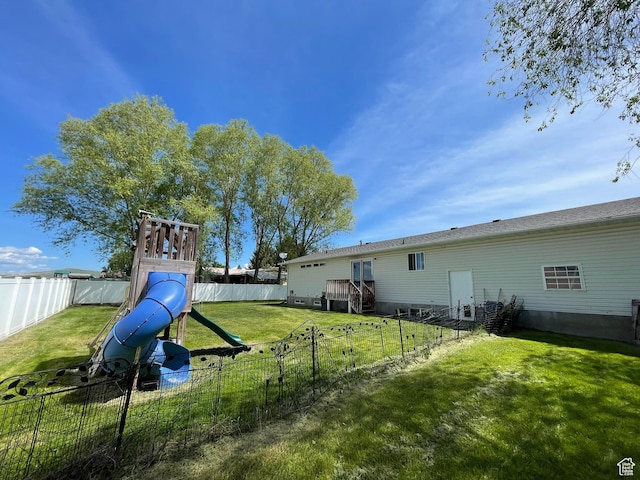 129 N 3rd E, Franklin, ID 83237 - fenced backyard featuring a playground