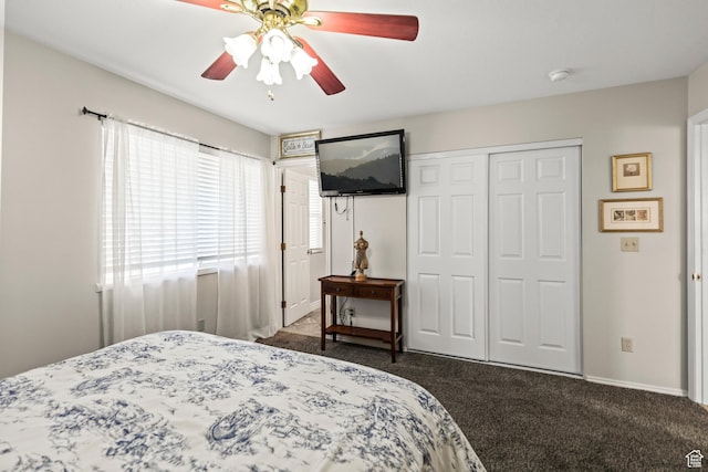 bedroom featuring a closet, ceiling fan, and carpet
