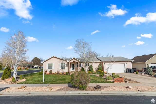 single story home featuring an attached garage, driveway, and a front lawn