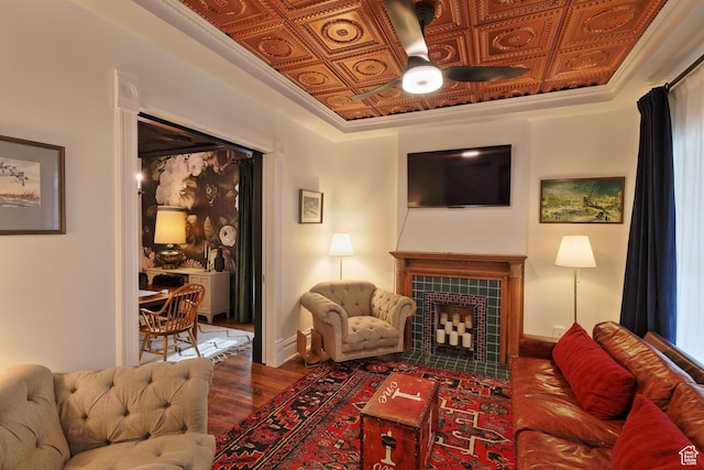 135 W 600 N, Salt Lake City, UT 84103 - living area with wood finished floors, ceiling fan, a tiled fireplace, and an ornate ceiling