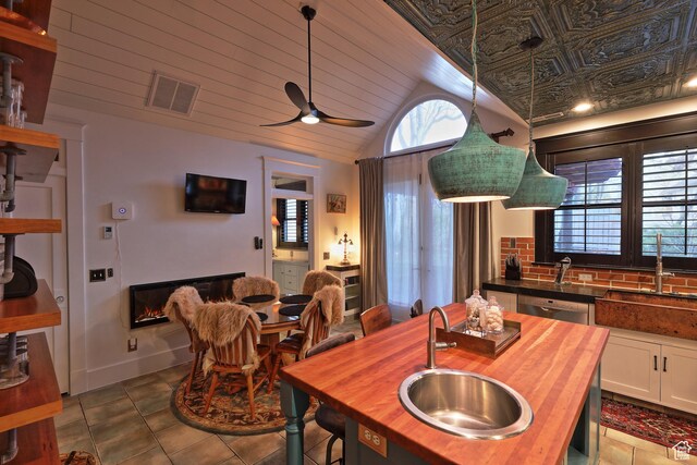 135 W 600 N, Salt Lake City, UT 84103 - dining area with a ceiling fan, vaulted ceiling, and visible vents