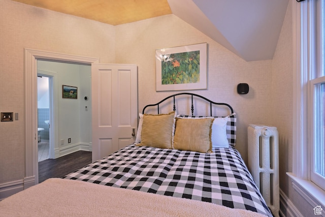 135 W 600 N, Salt Lake City, UT 84103 - bedroom featuring radiator heating unit, dark wood-style flooring, baseboards, and lofted ceiling