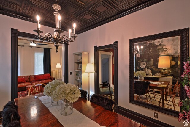 135 W 600 N, Salt Lake City, UT 84103 - dining area featuring a notable chandelier, an ornate ceiling, and wood finished floors