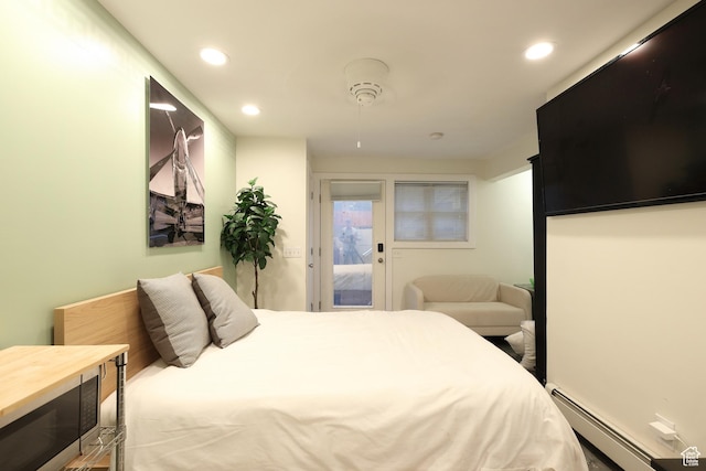 135 W 600 N, Salt Lake City, UT 84103 - bedroom with recessed lighting, access to exterior, and a baseboard heating unit
