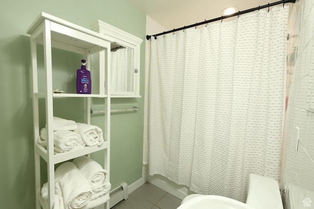 135 W 600 N, Salt Lake City, UT 84103 - bathroom featuring shower / bath combination with curtain, baseboards, tile patterned flooring, and baseboard heating