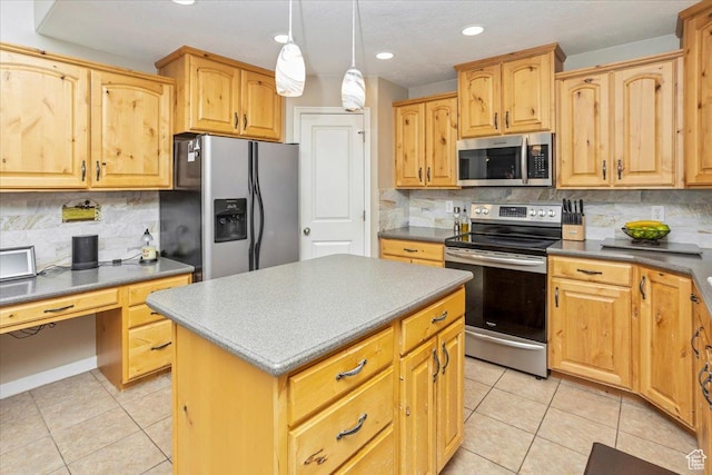 kitchen with light tile patterned floors, decorative backsplash, and appliances with stainless steel finishes
