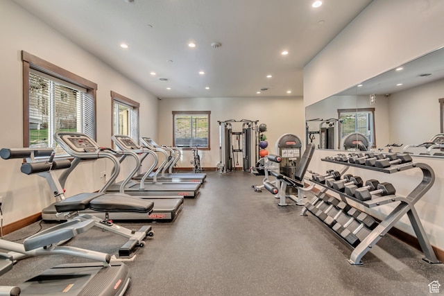 gym with recessed lighting and baseboards