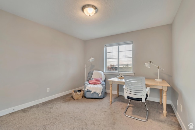 office featuring baseboards and carpet floors