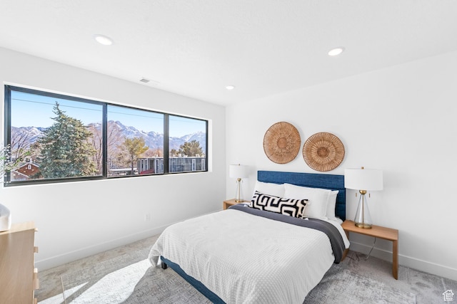 4372 S 900 E Unit 102, Millcreek, UT 84124 - carpeted bedroom with baseboards, recessed lighting, and a mountain view