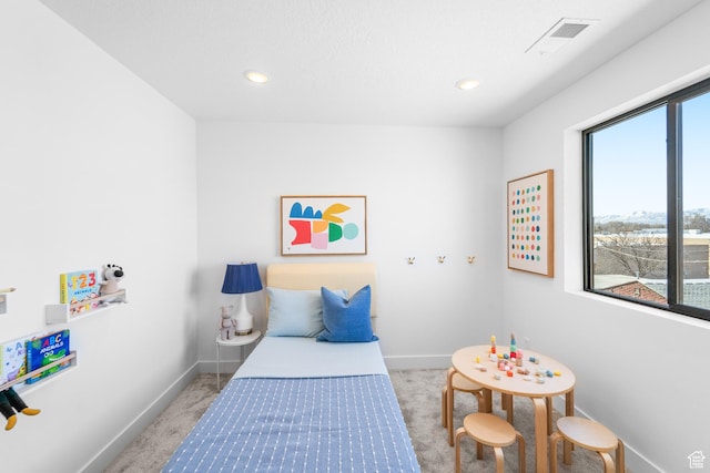 4372 S 900 E Unit 102, Millcreek, UT 84124 - bedroom with light carpet, baseboards, and recessed lighting