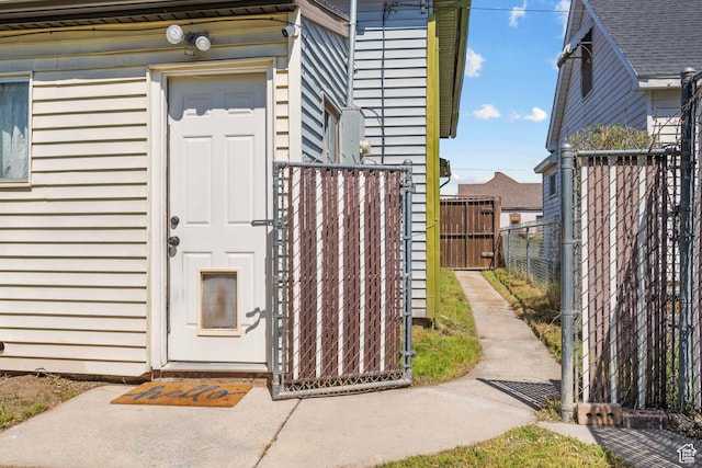 property entrance with fence
